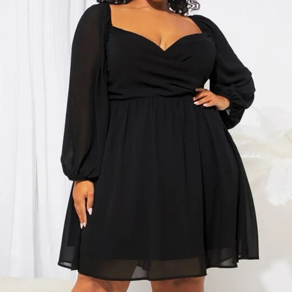 Black long sleeve, sweetheart-neck, knee length dress